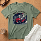 Drive It Like You Stole It T-Shirt — Raccoon Driving Golf Cart Graphic Tee